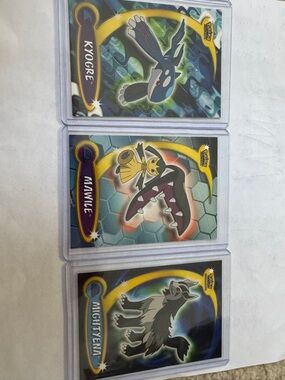 Pokemon Trading Cards - Blue, Yellow, Black Accent Kyogre Mawile Mightyena